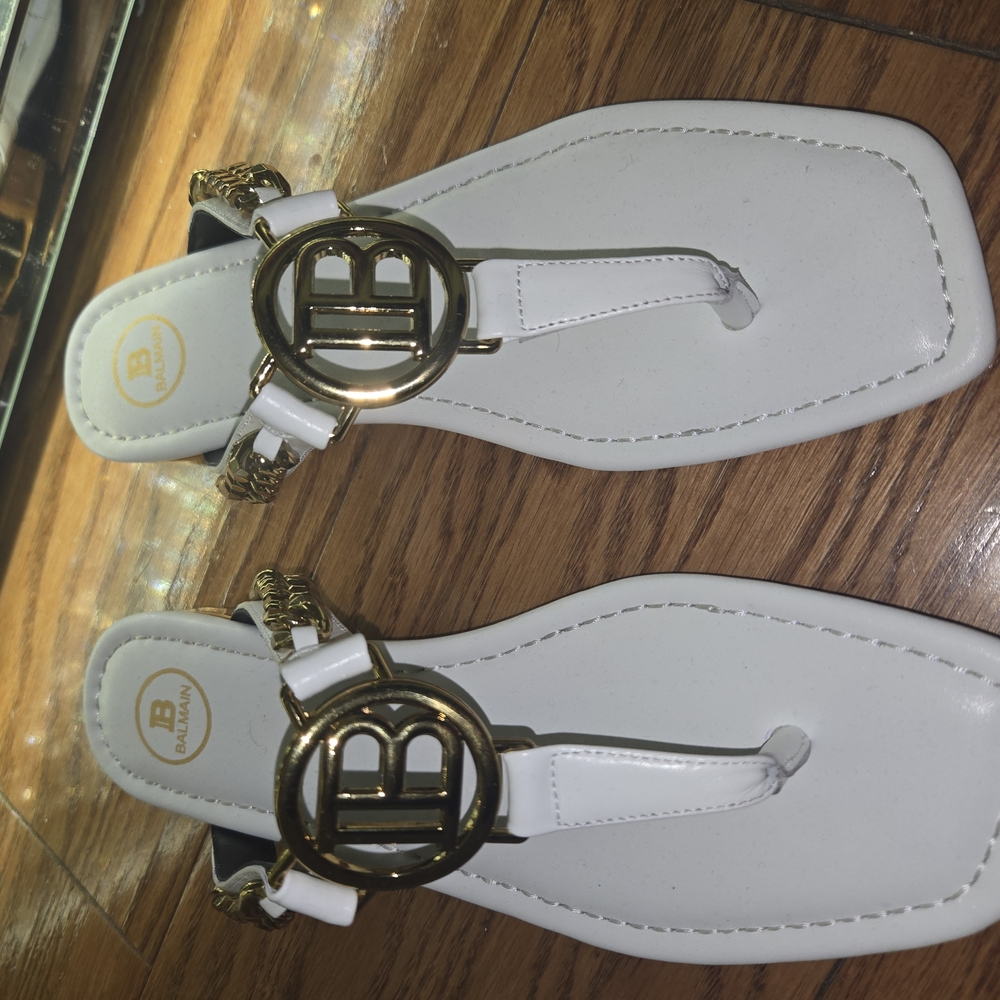 Elegant White Sandals with Gold Accents